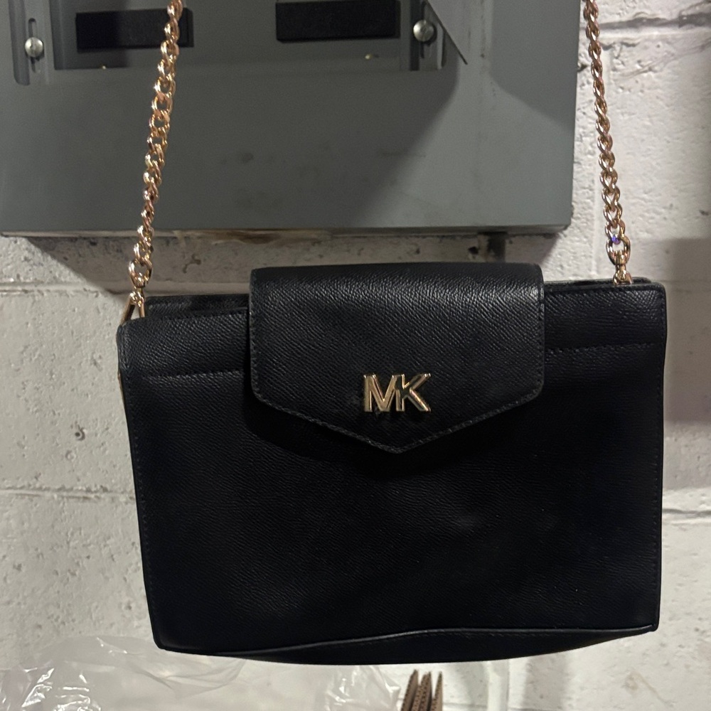 Preowned Michael Kors black leather clutch crossbody bag with gold-tone hardware